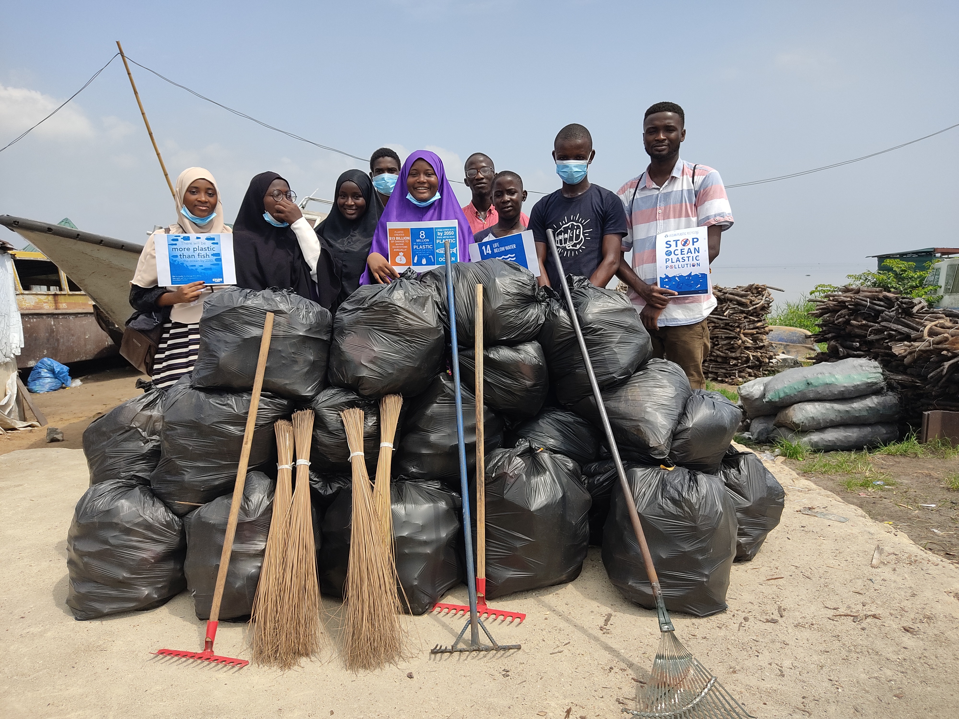 Sohfiyyah Murtadho and a local clean-up group in Nigeria