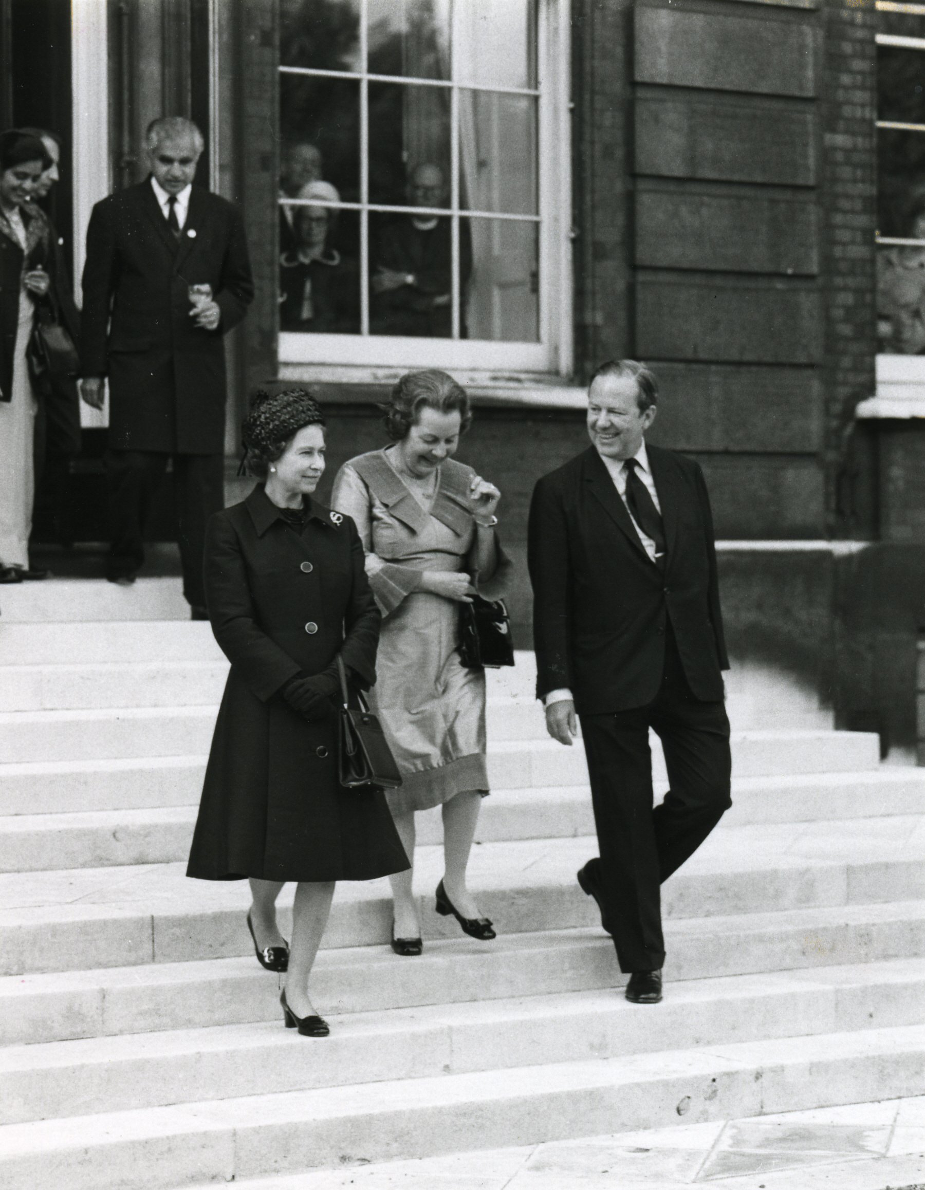 Her Majesty The Queen and former Secretary-General Sir Arnold Smith