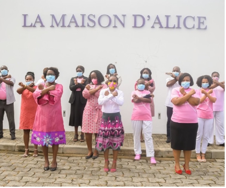Staff from La Maison D’Alice or Alice House, in Gabon, standing united in the fight against women cancers.