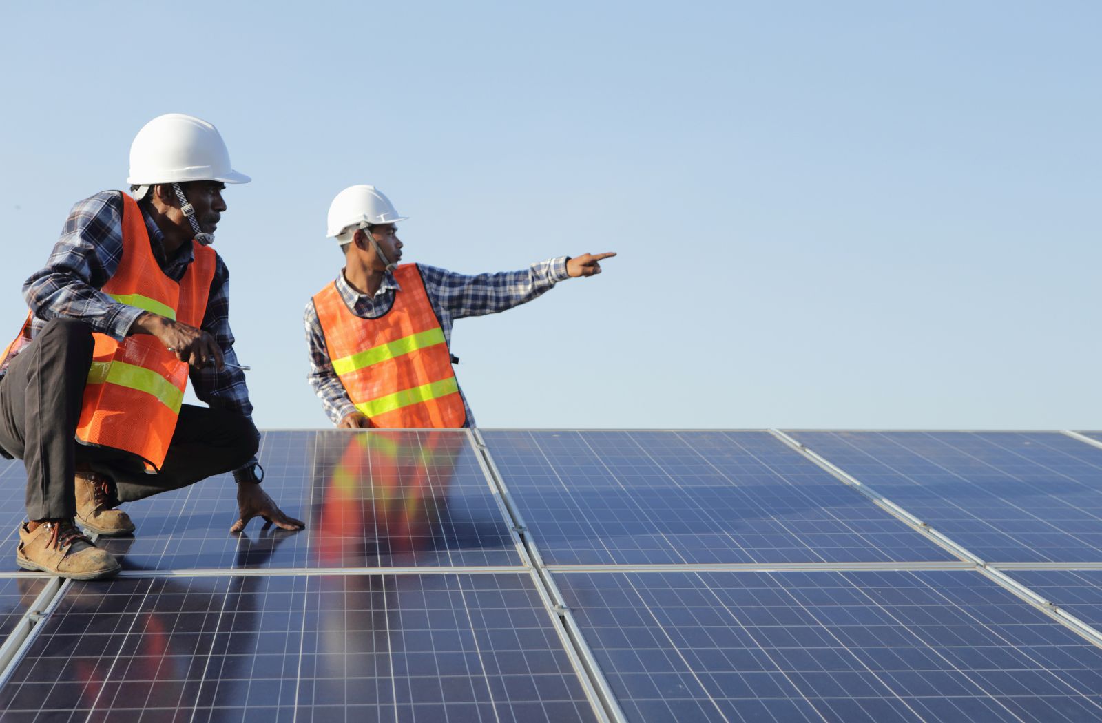 two engineers with solar panels