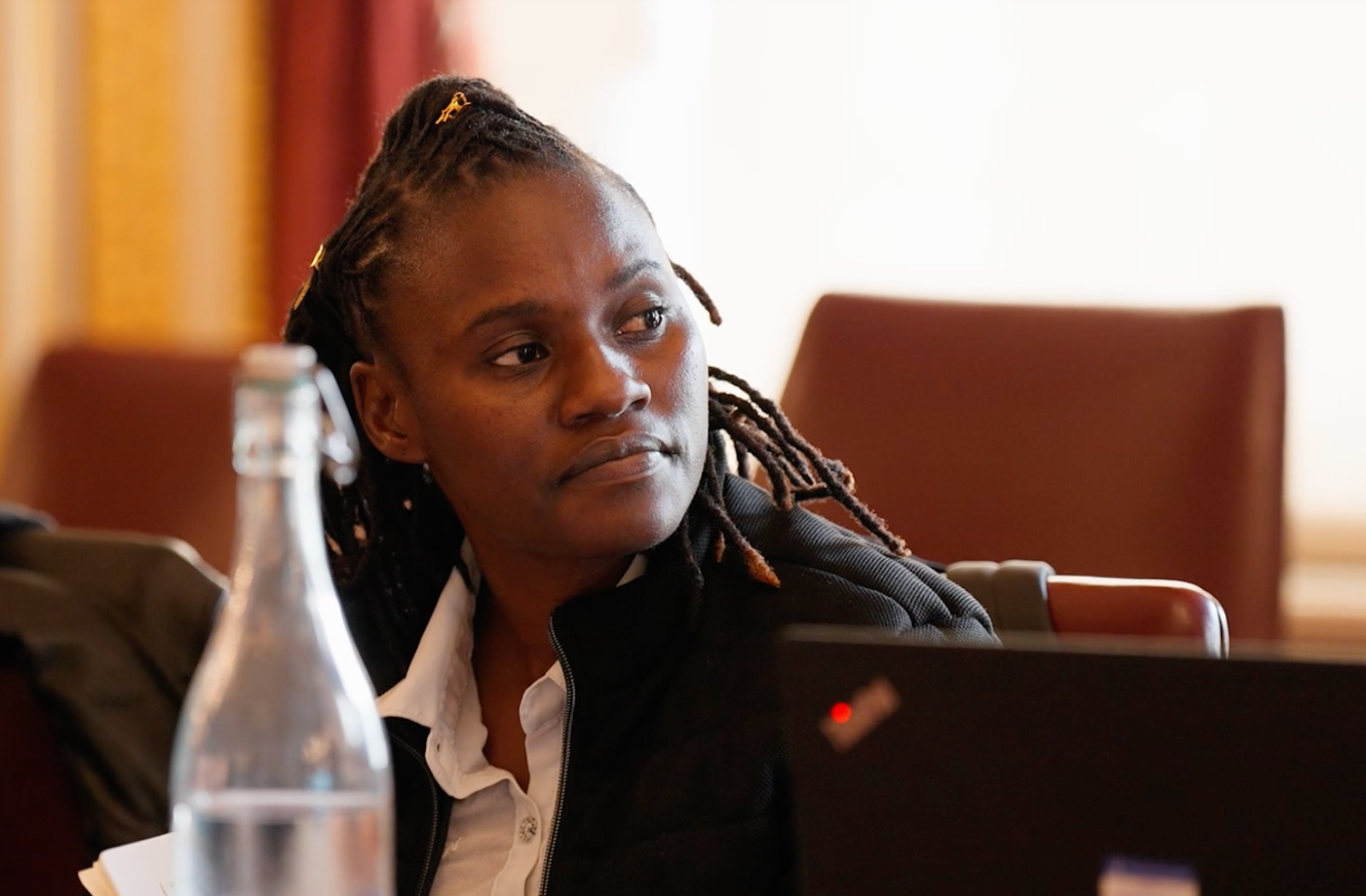 Eunice Shapange Girl looking at speaker