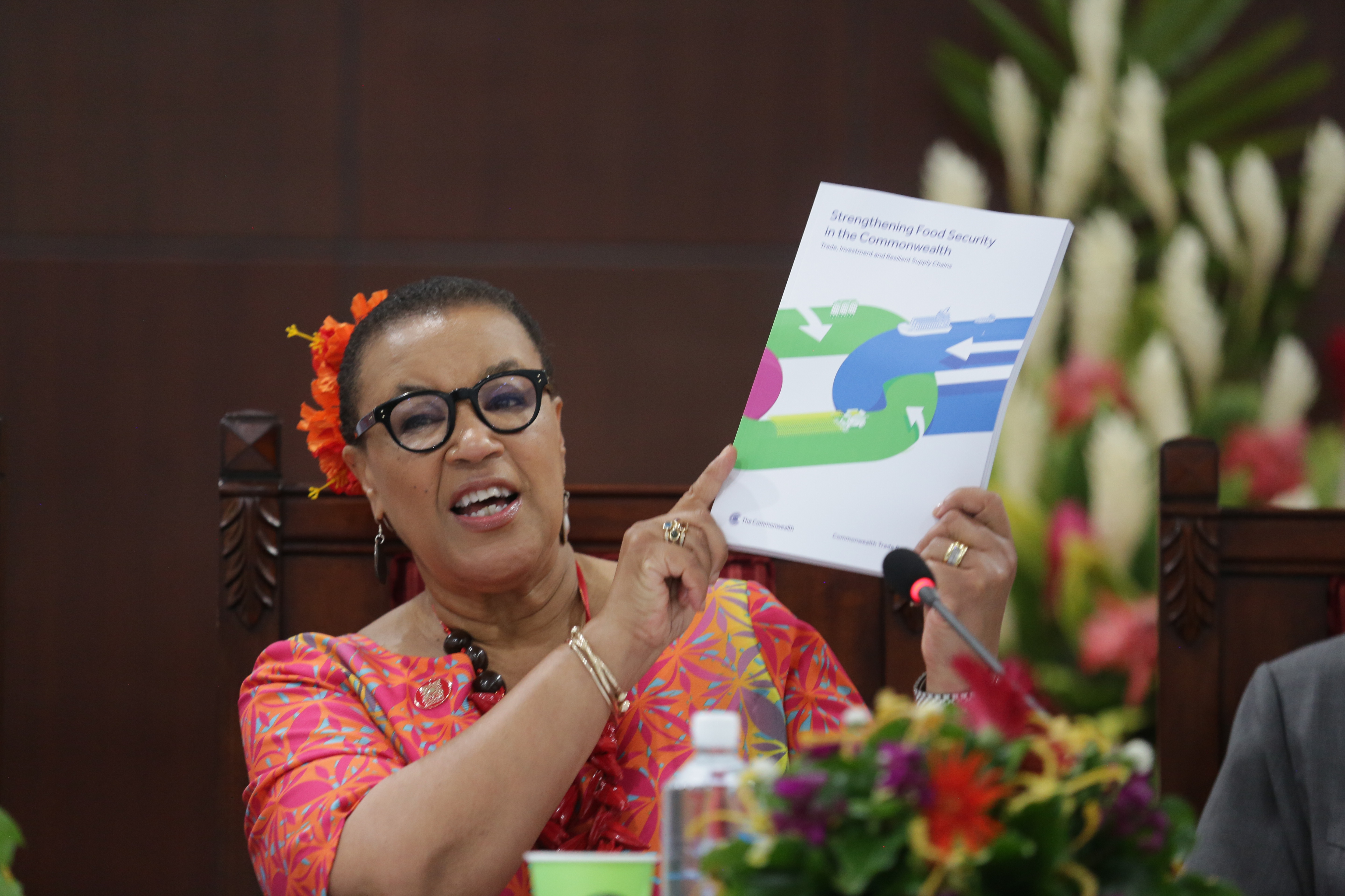 Commonwealth Secretary-General holding the 2024 Commonwealth Trade Review