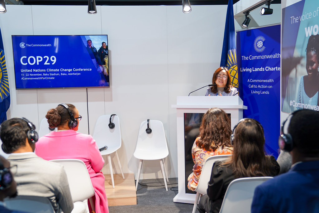 A youth leader speaks at the Commonwealth Pavilion