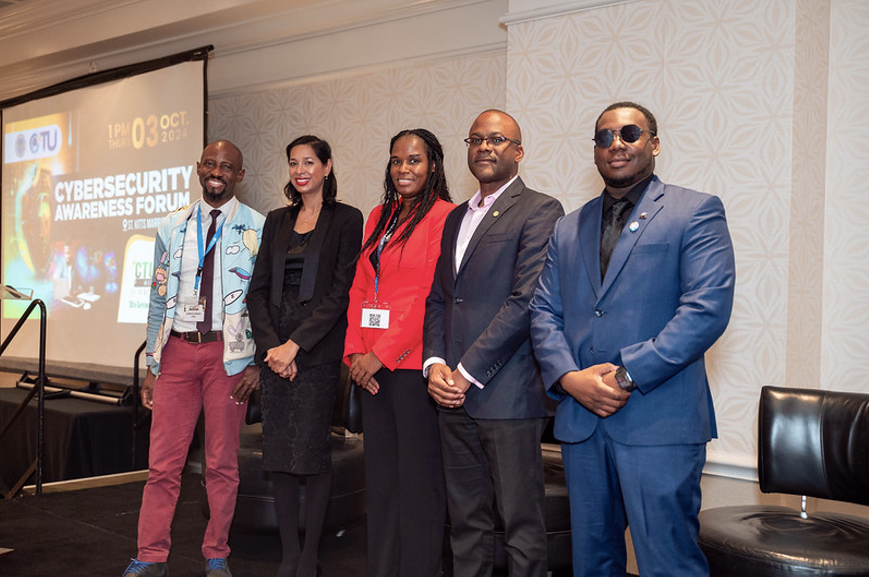 Speakers posing for photograph