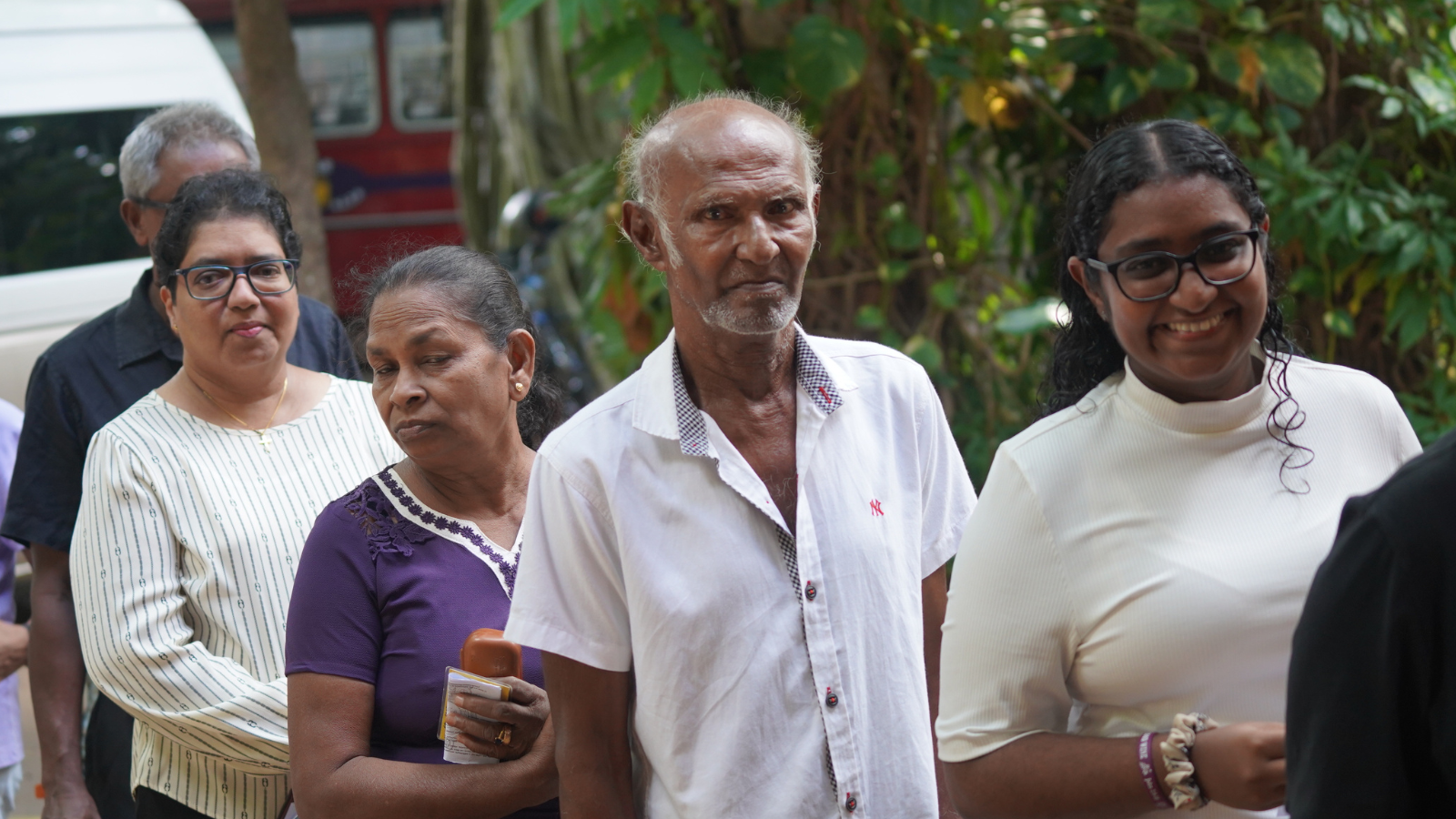 Dilushi and her parents in the queue to cast their ballot