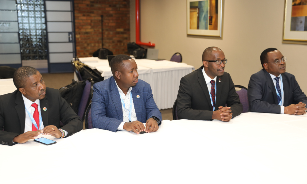 Mxolisi Sibanda, Interim Head of Climate Change, sitting with other attendees at the Regional Dialogue 