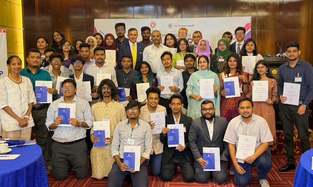 Group photo of participants with their certificates of completion at the Commonwealth Charter workshop in Dhaka, Bangladesh
