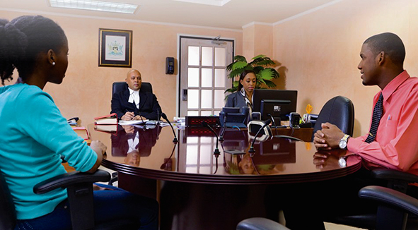 a former couple going through divorce proceedings meet with a judge and clerk