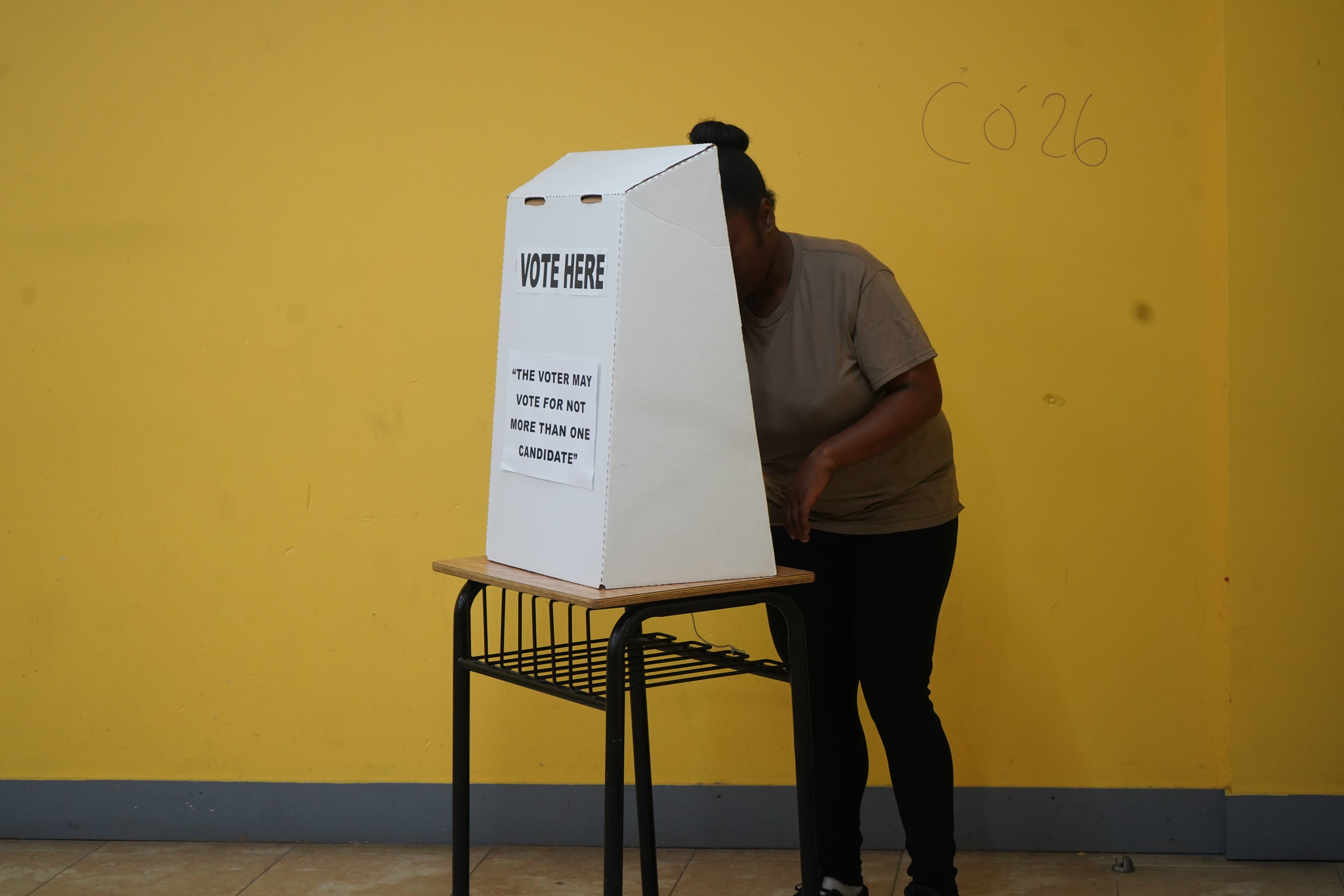 Woman casting vote in Antigua and Barbuda