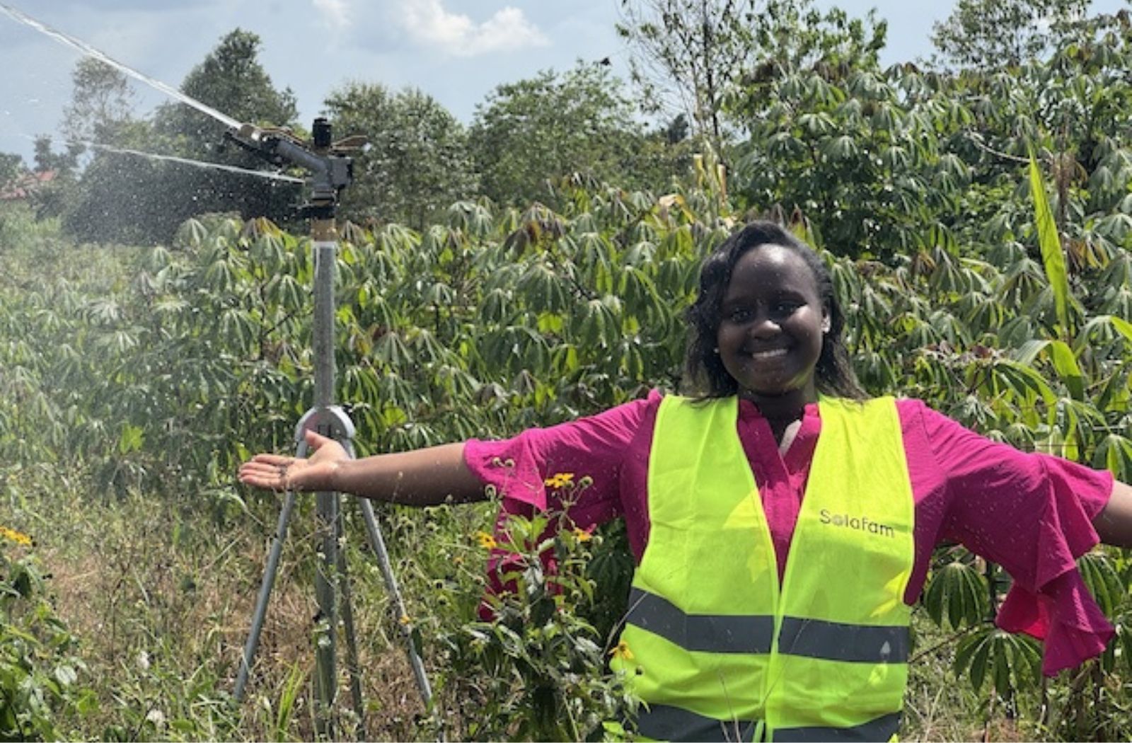 Shifra Ainomugisha, 2026 Commonwealth Young Person of the Year, stands in a field with crops behind her
