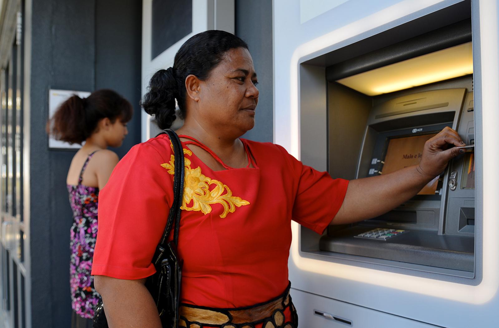 Woman at bank, Tonga