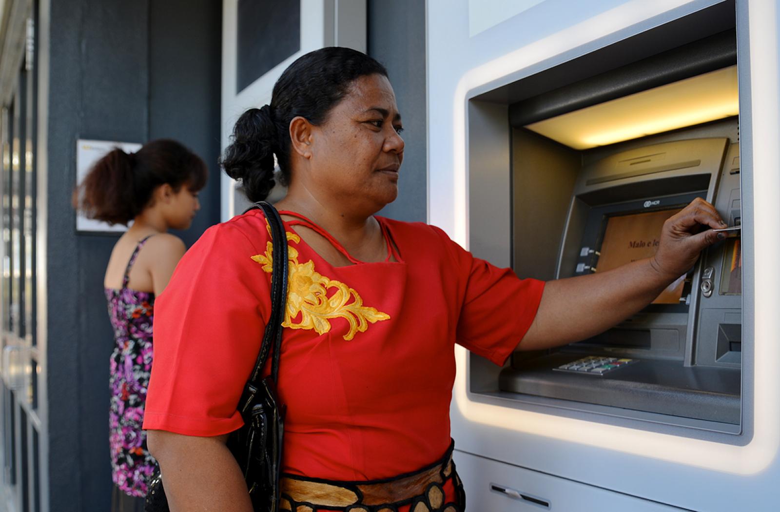 Woman at bank, Tonga