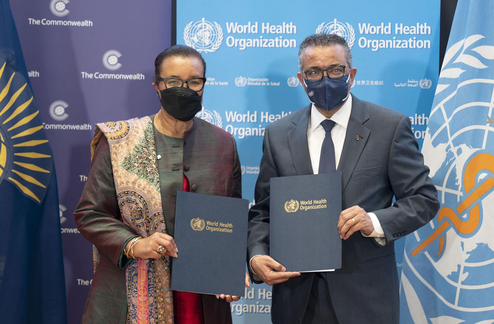 Commonwealth Secretary-General and WHO Director-General with signed MoU