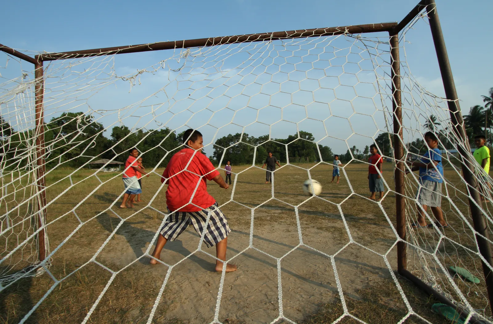 Children playing soccer