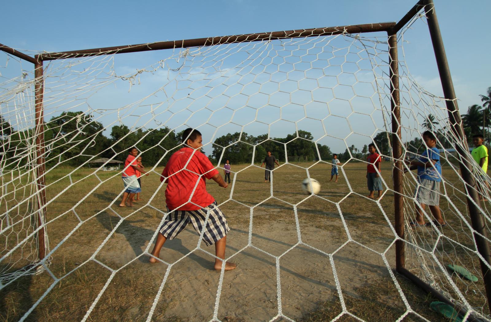 Children playing soccer