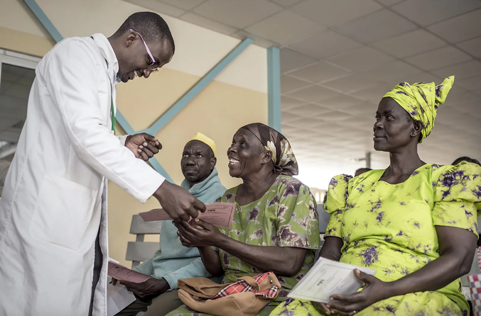 A doctor talking to patients