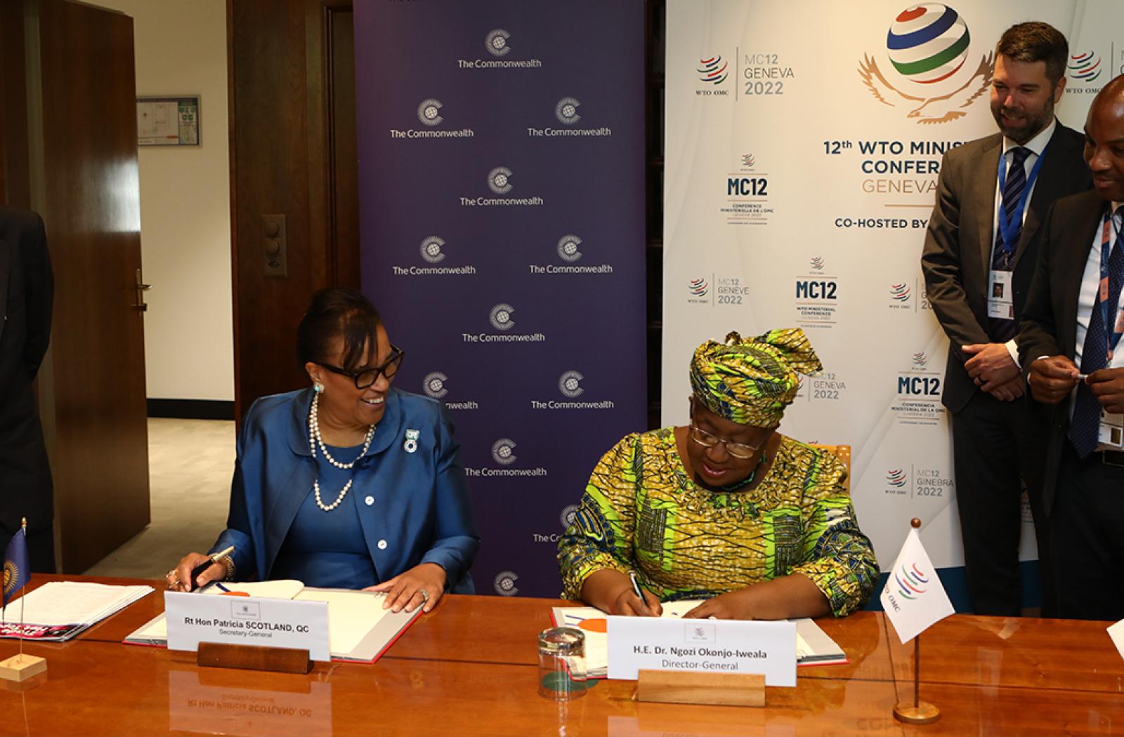 Secretary General of the Commonwealth and Director General signing the MoU