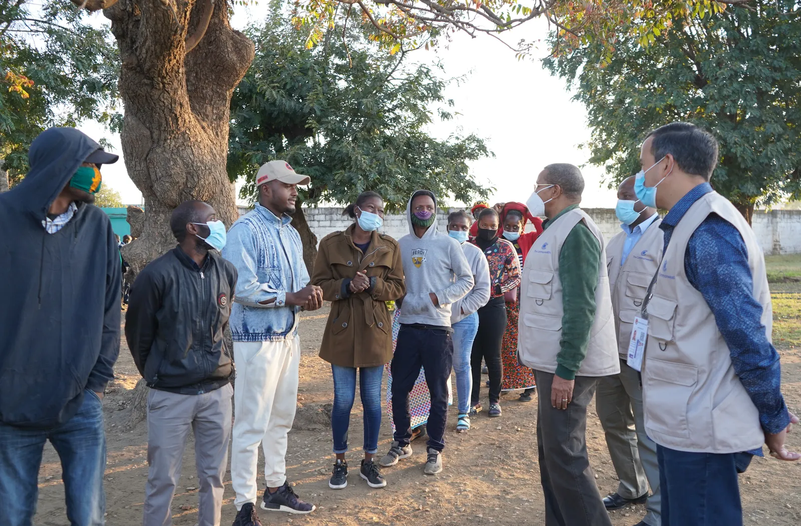 People wait to cast their vote in the 2021 general elections in Zambia