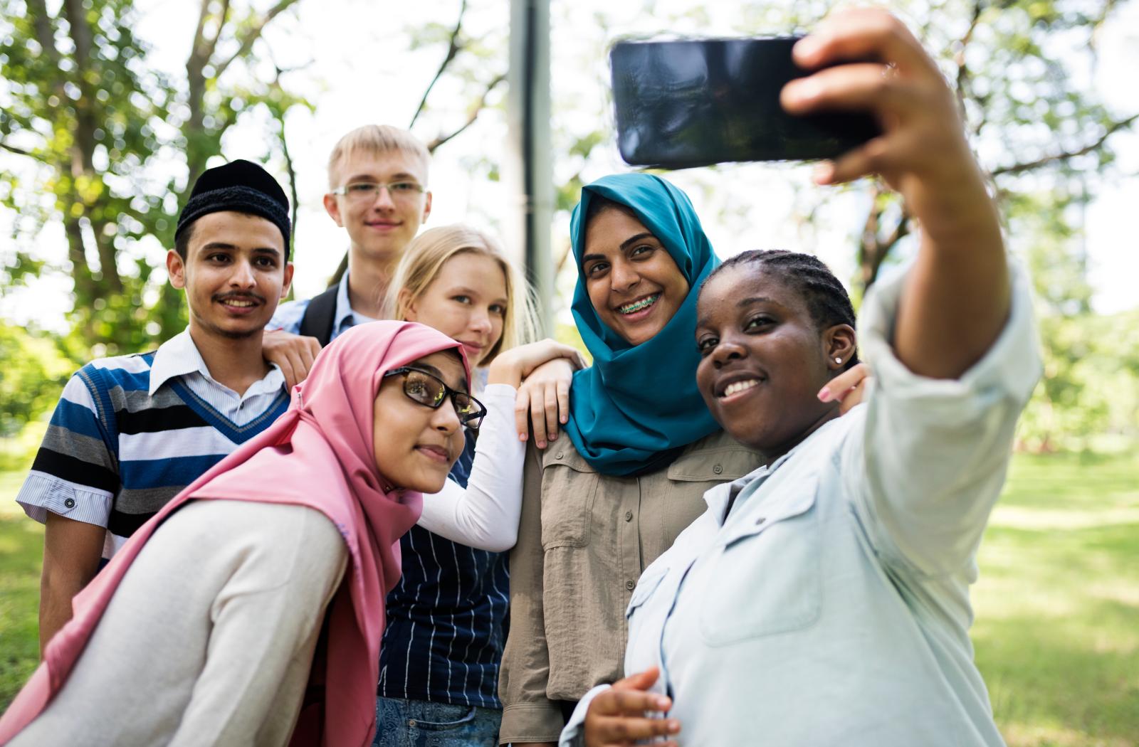 A group of young people taking a selfie