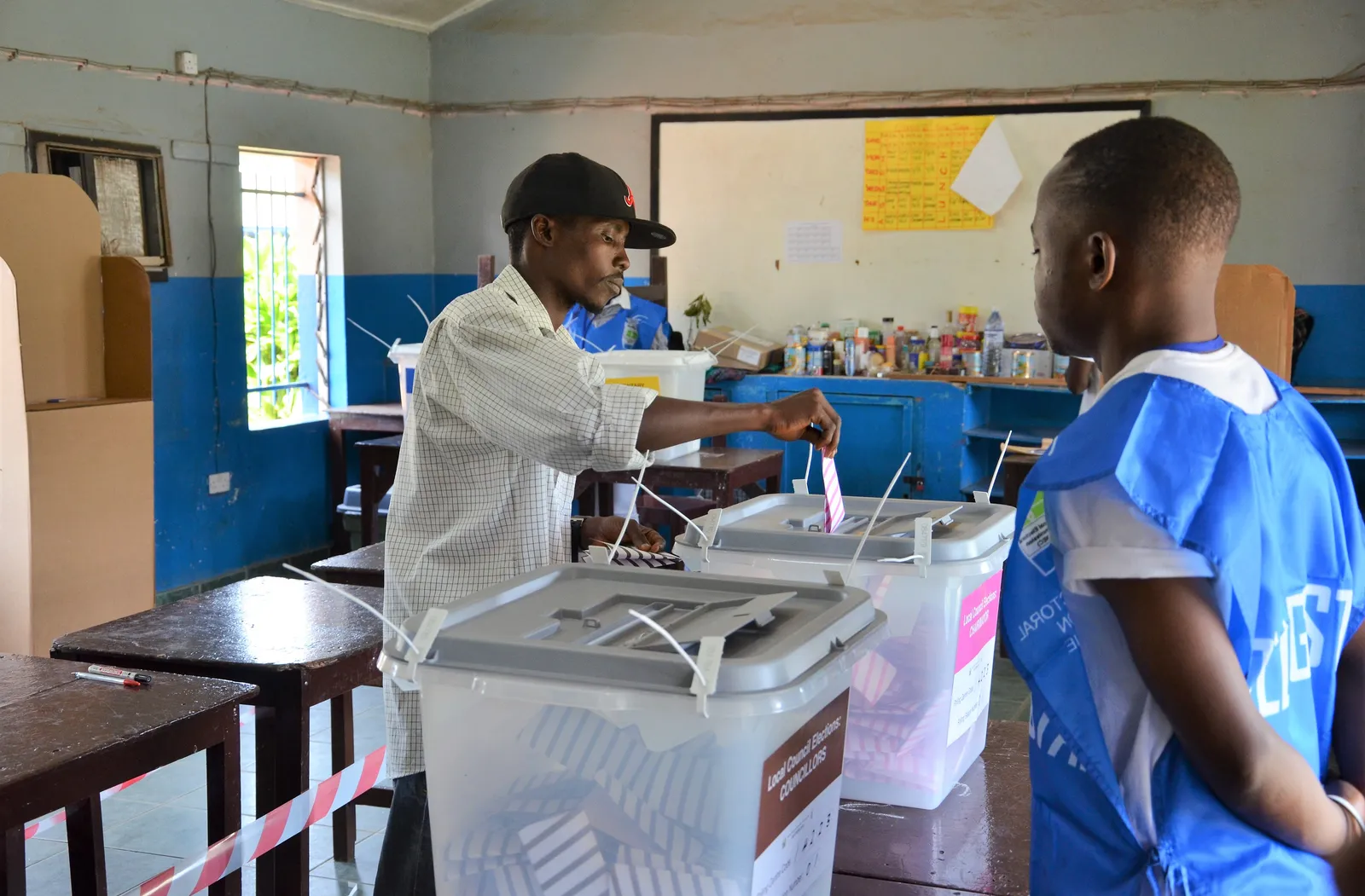 Voter casting his ballot