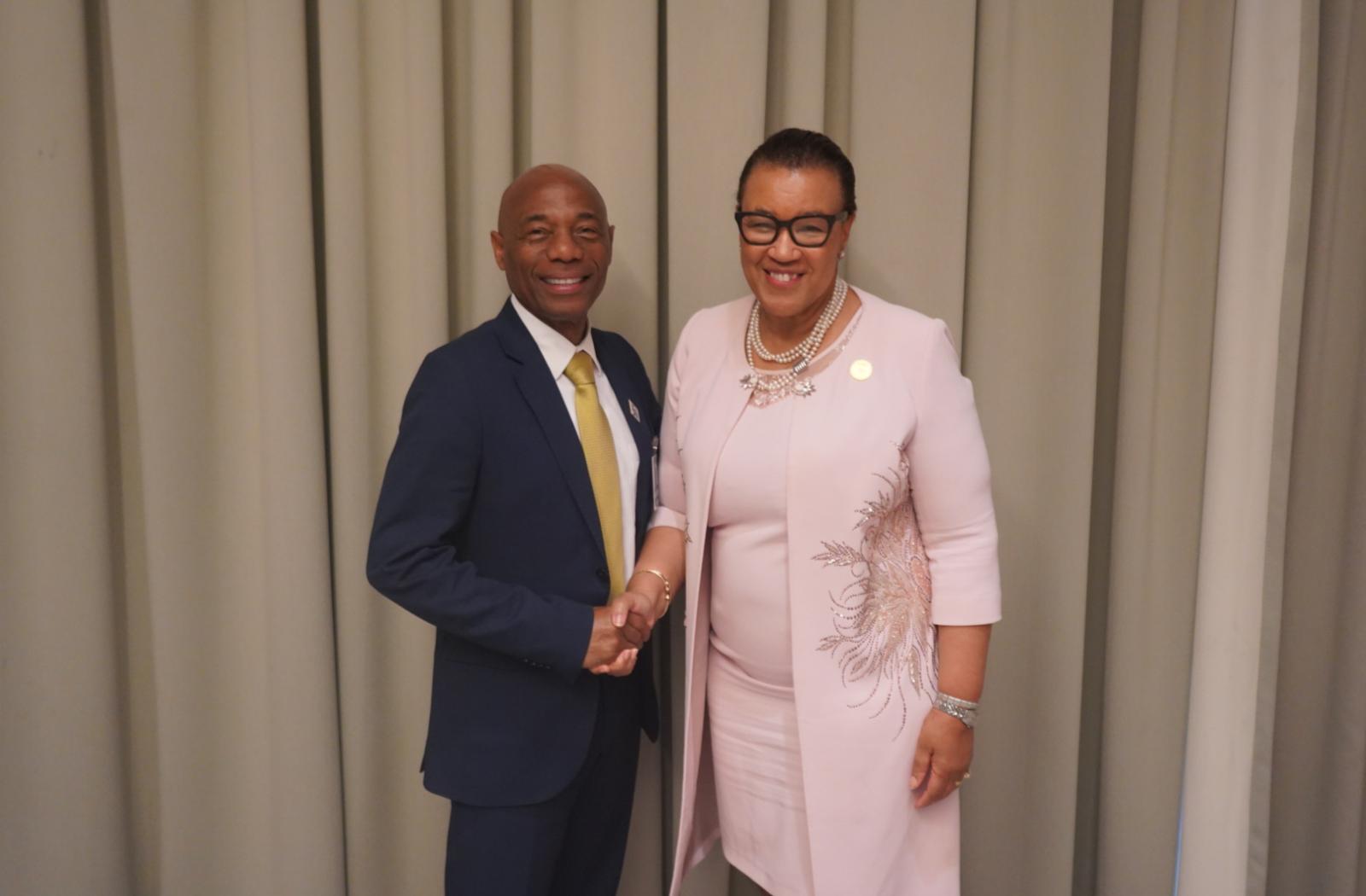 Secretary-General and the President of CDB shaking hands