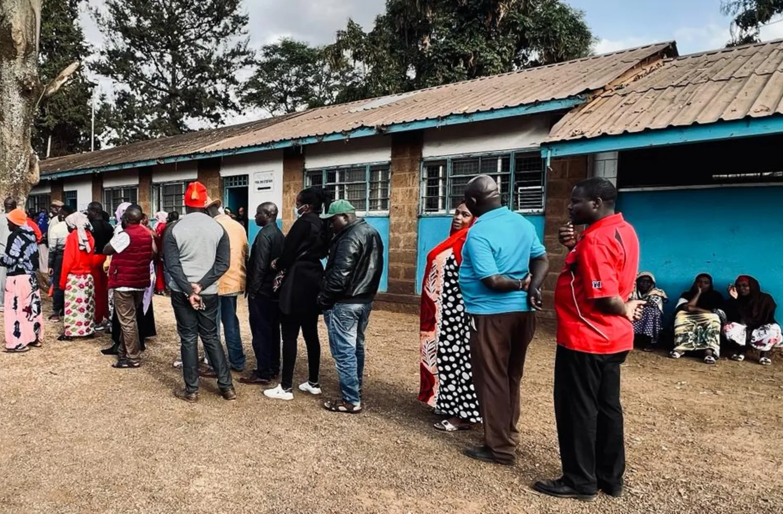 Voters wait to cast their vote in the 2022 Kenya general elections