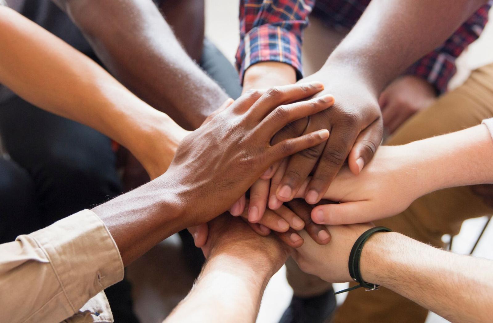 hands coming together