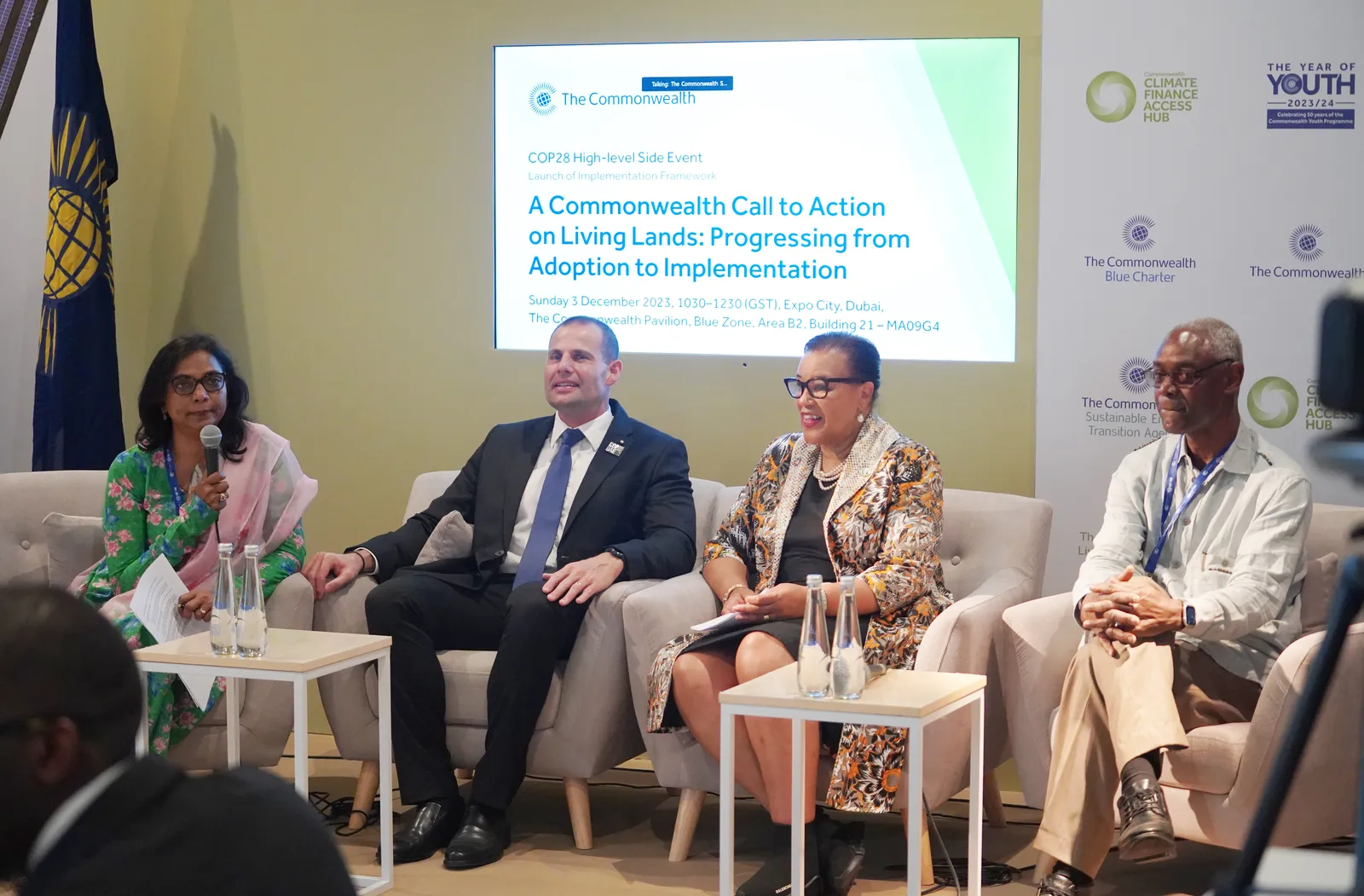 The panel at the implementation of the Living Lands Charter event at COP28