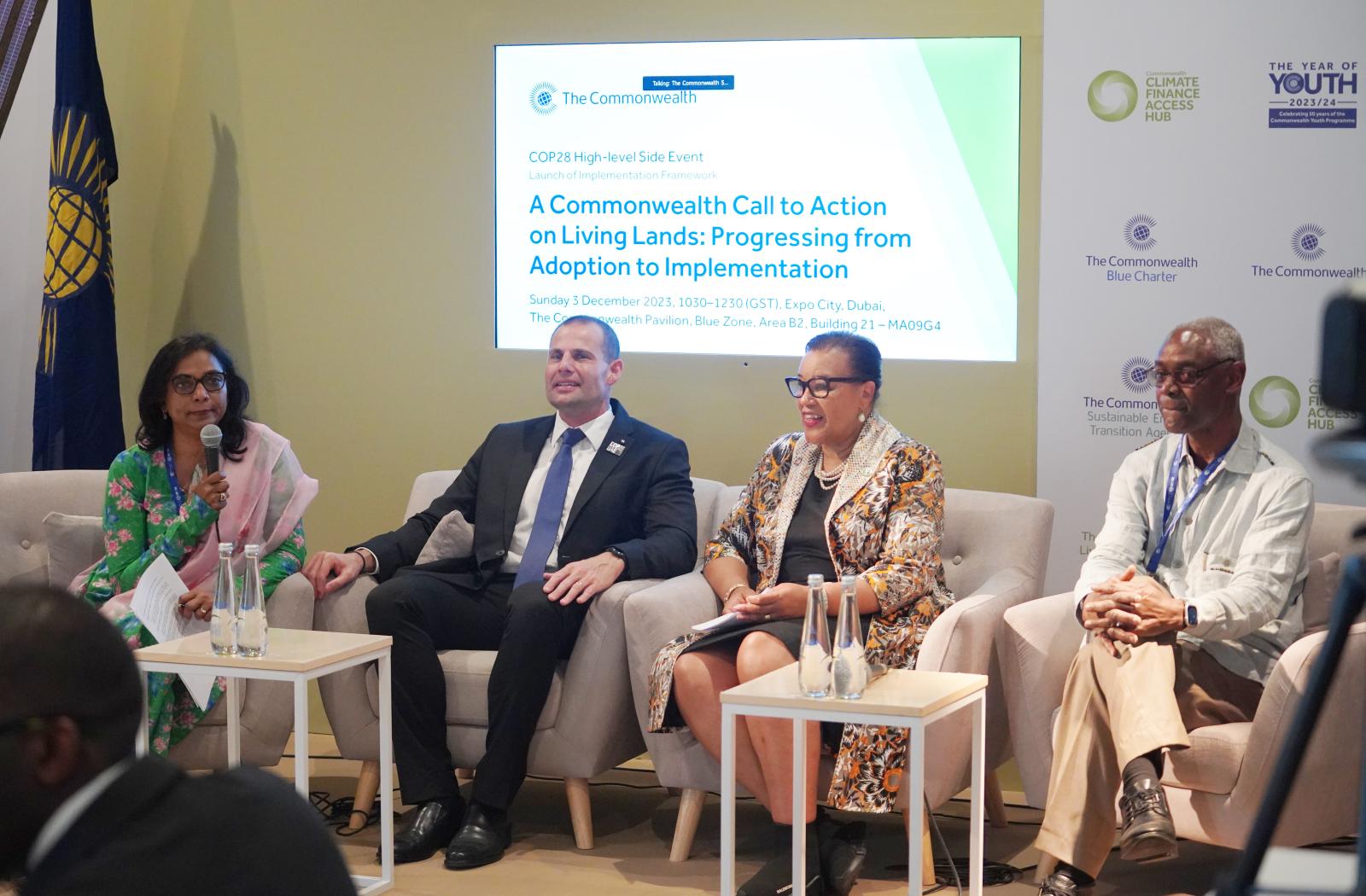 The panel at the implementation of the Living Lands Charter event at COP28