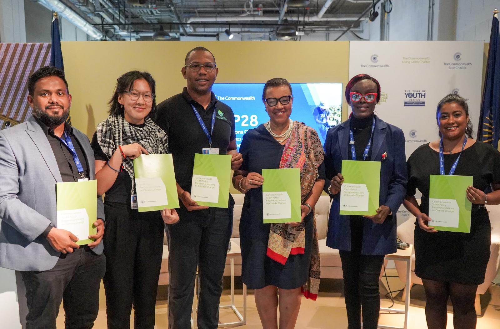 Youth leaders and Commonwealth Secretary-General at COP28