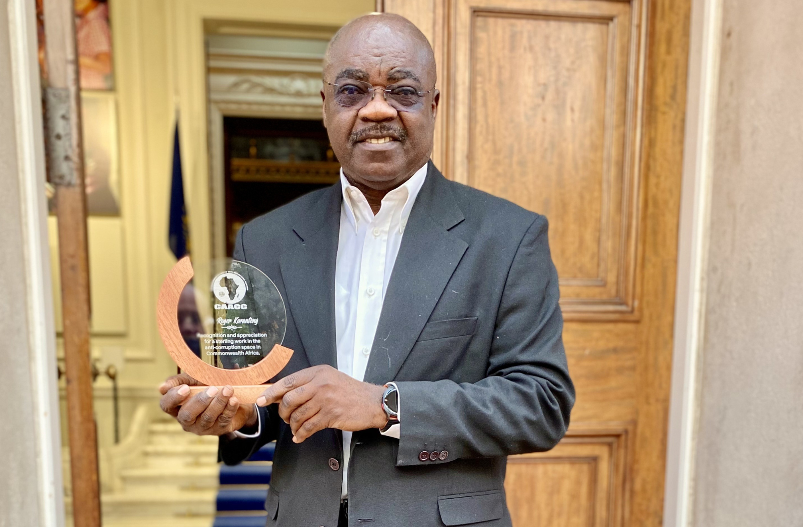 Dr Roger Koranteng with Governmeent of Botswana Award