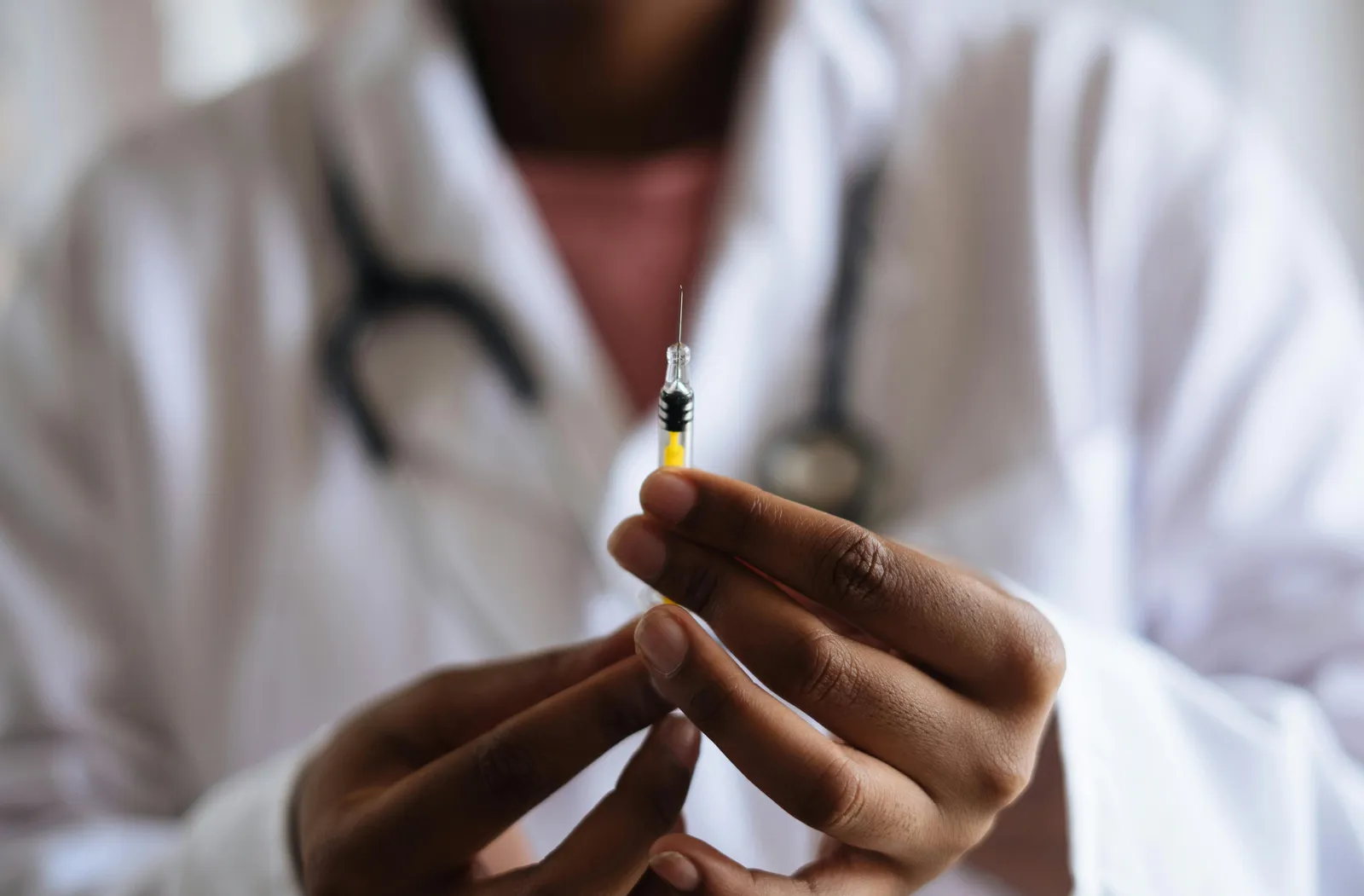Nurse holding a neede