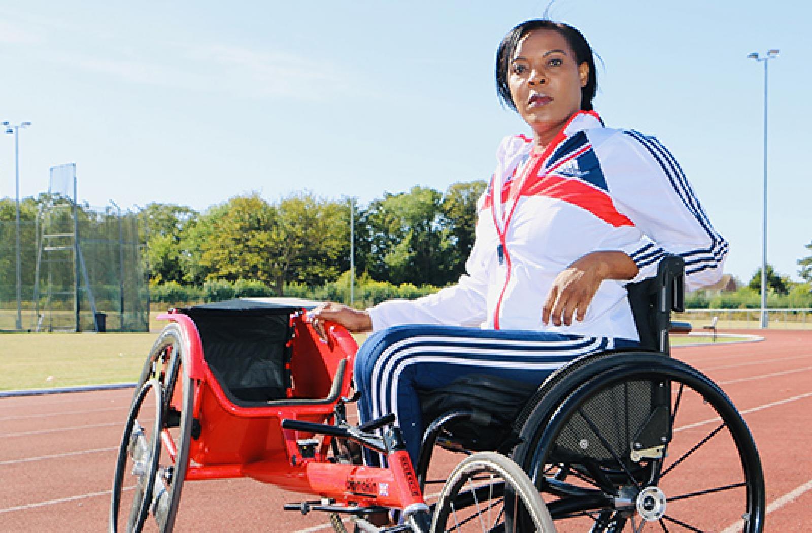 Paralympic-athlete-in-her-wheelchair-on-a-sports-track