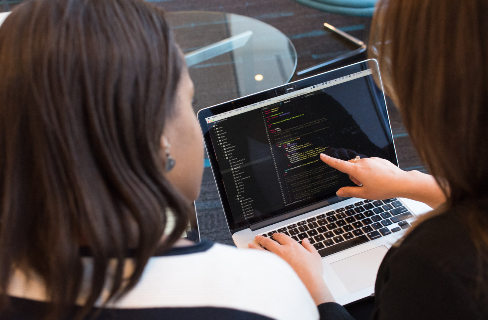Two women on a laptop