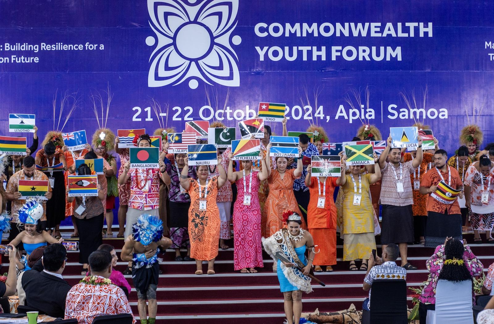 Commonwealth Youth Forum at CHOGM 2024 flags on stage
