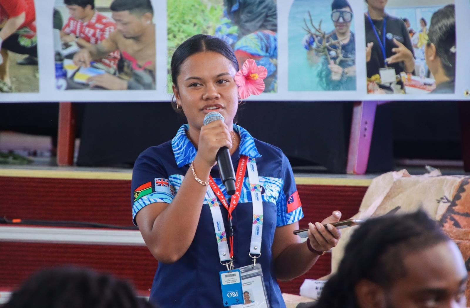 Young woman delegate speaking at the Commonwealth Youth Forum