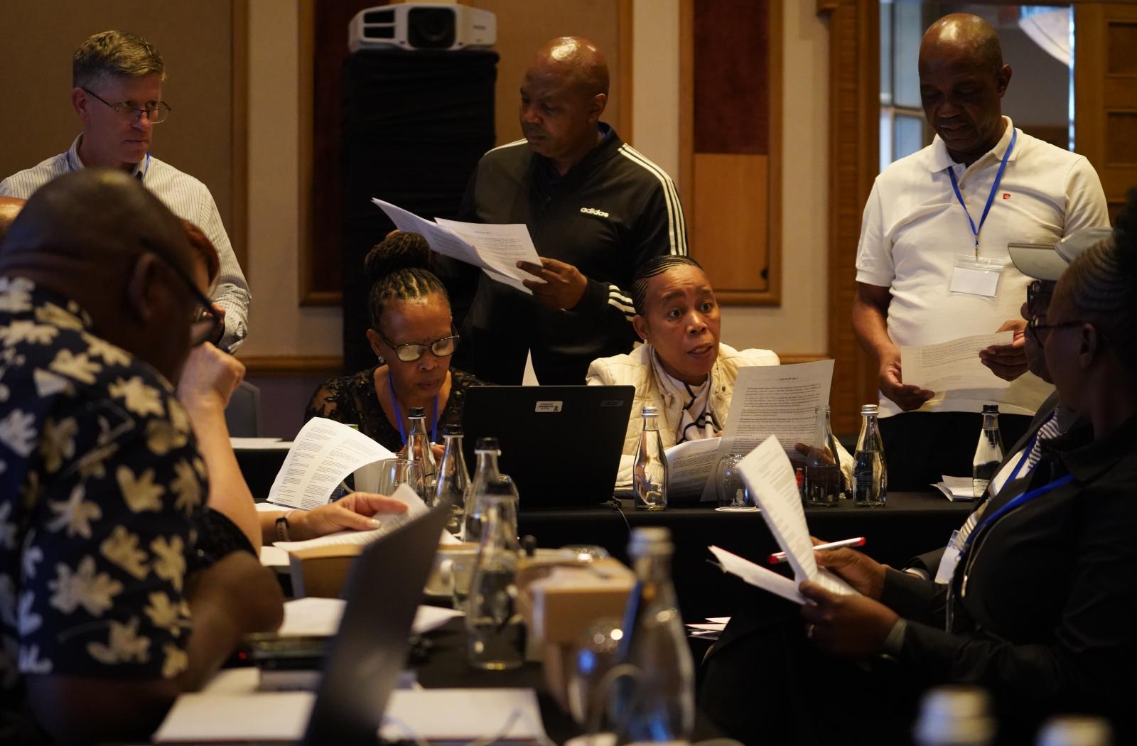 People sat around a desk