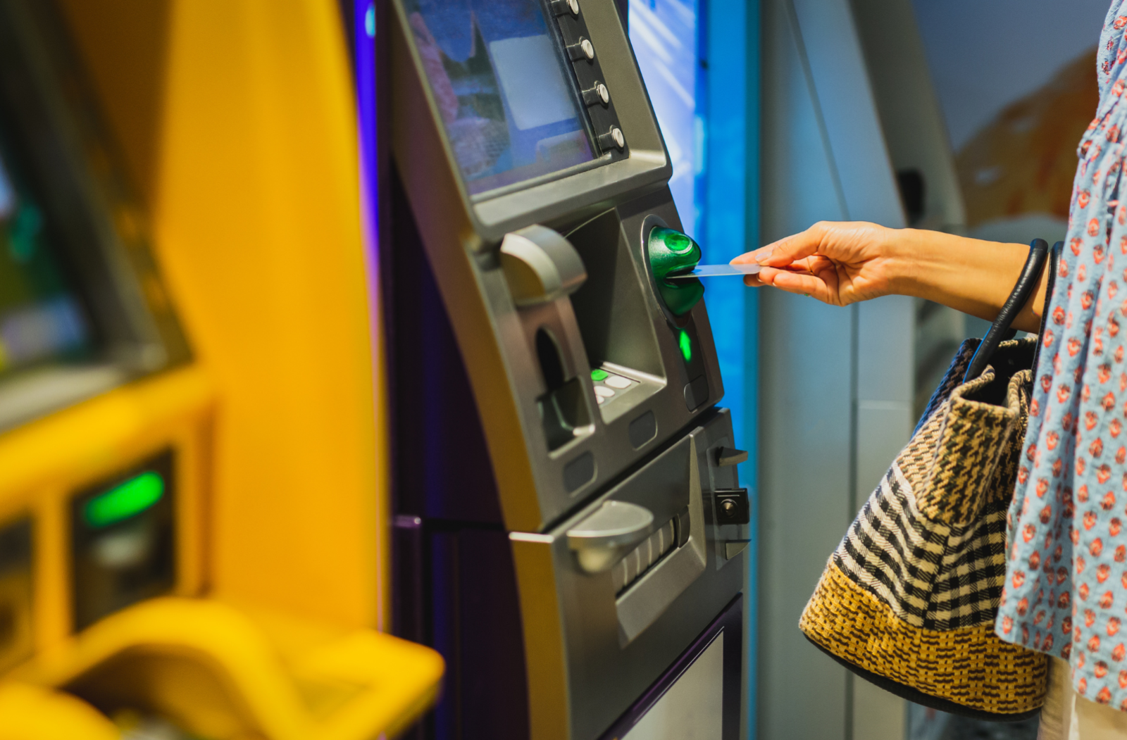 Person using ATM