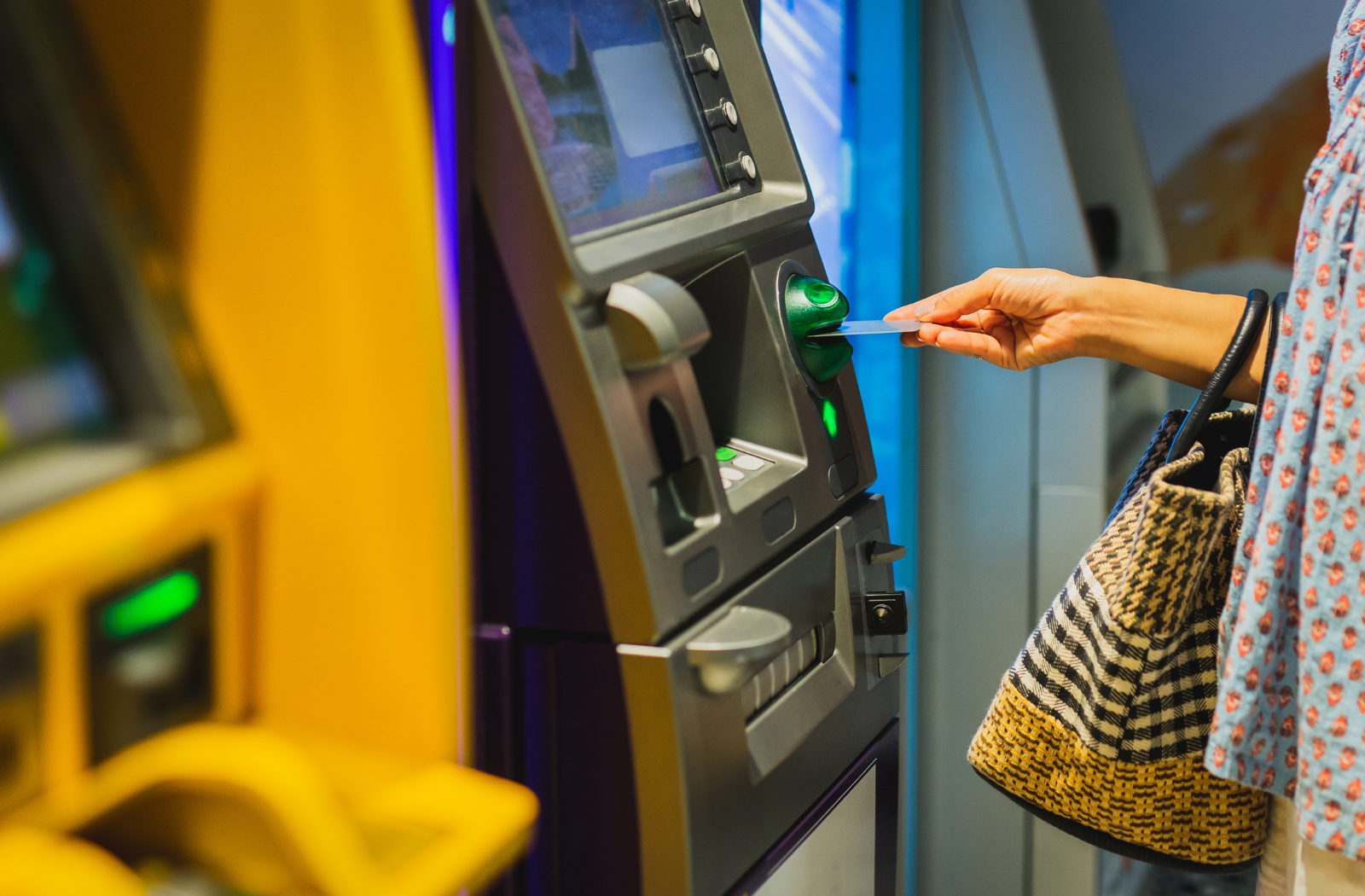 Person using ATM