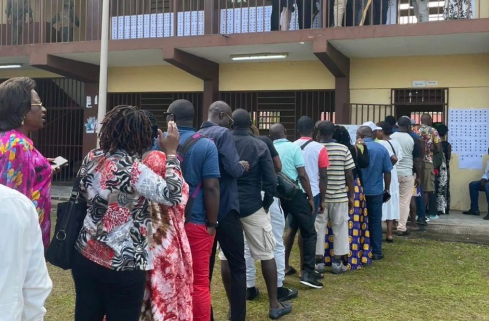 People queue to cast their vote in the Gabon Constitutional Referendum