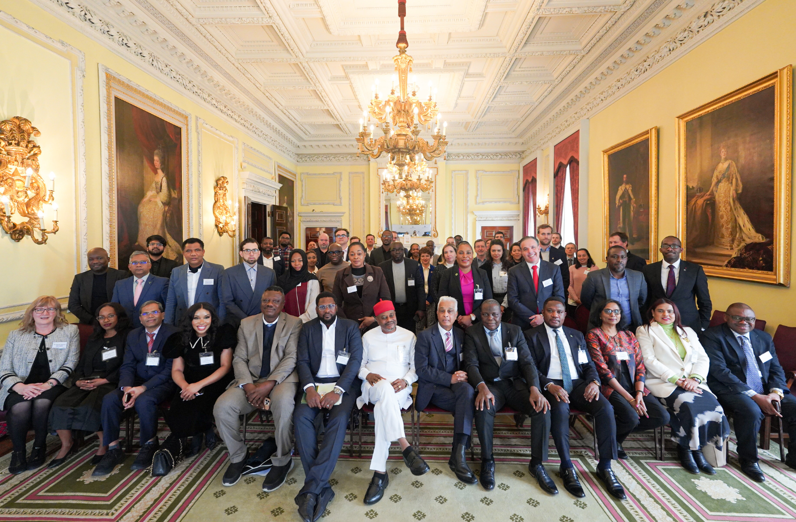 A group photo of attendees at the Nigerian roundtable event at Marlborough House