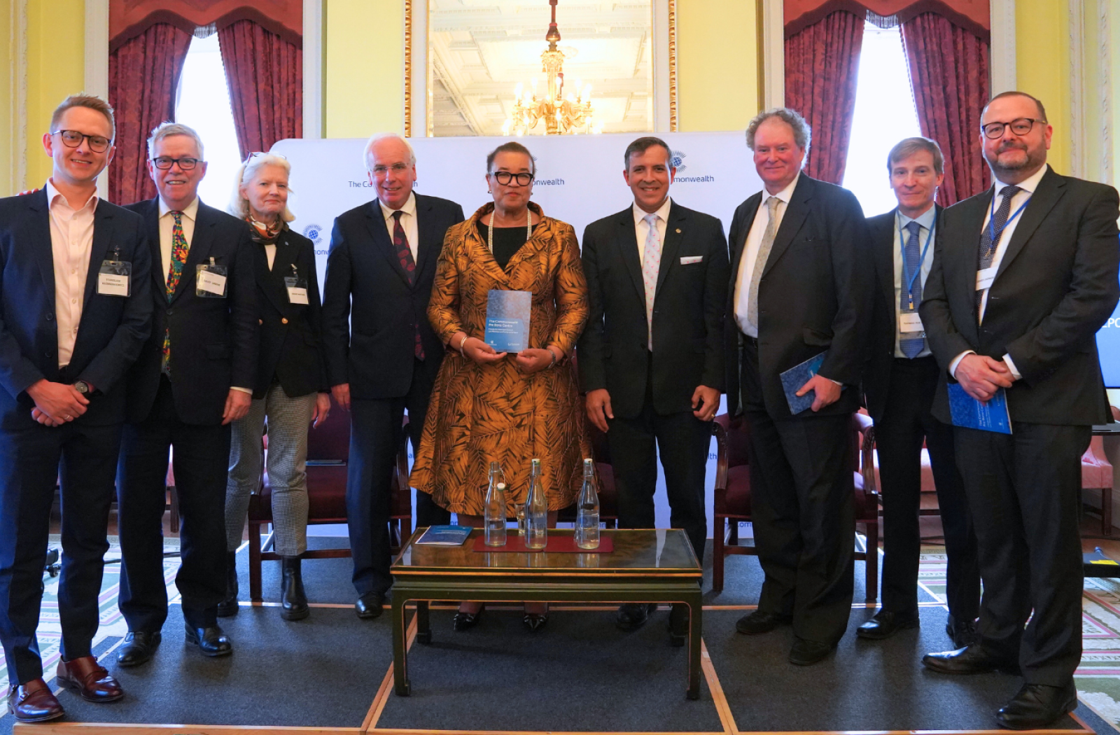 SG Scotland and 8 others standing posing in a group picture