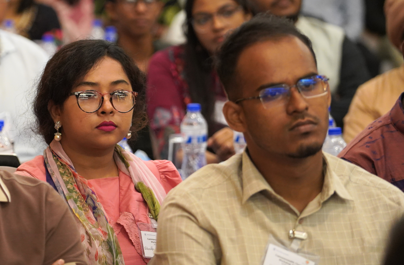 Two attendees at the Commonwealth Charter workshop