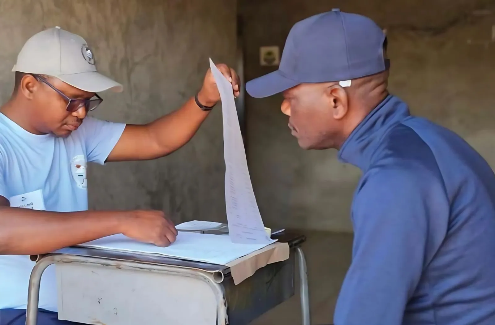 crosschecking of voter id against the electoral register in Botswana