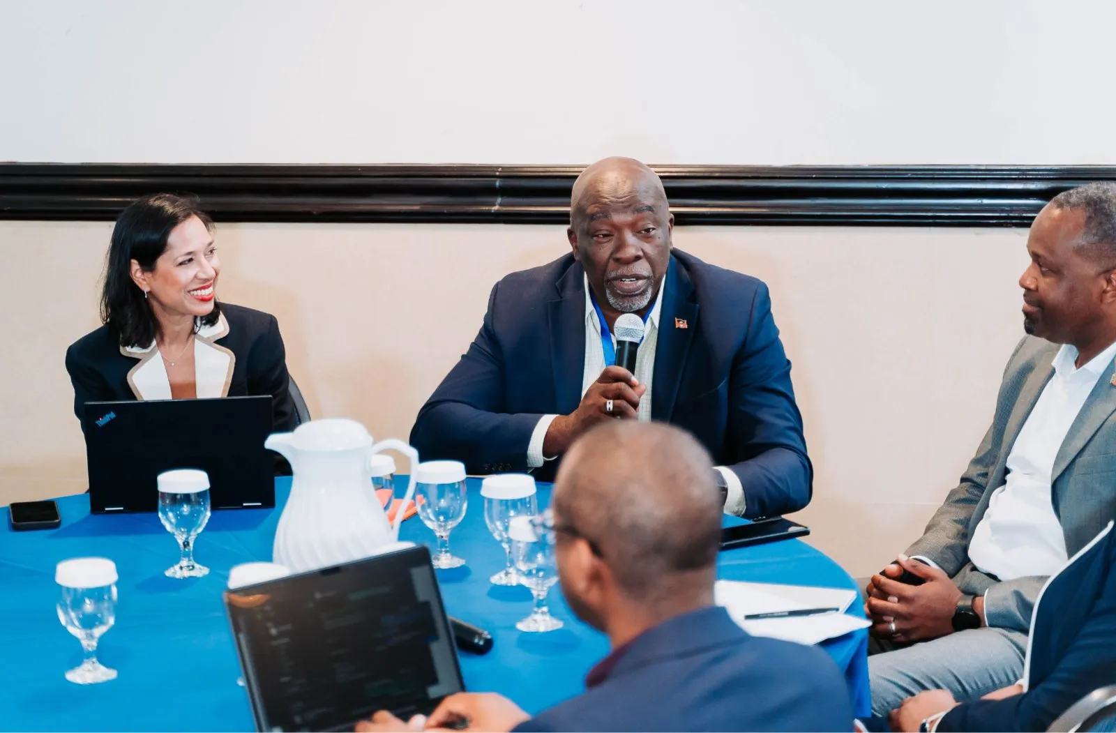 four delegates at the launch of model law on digital trade 