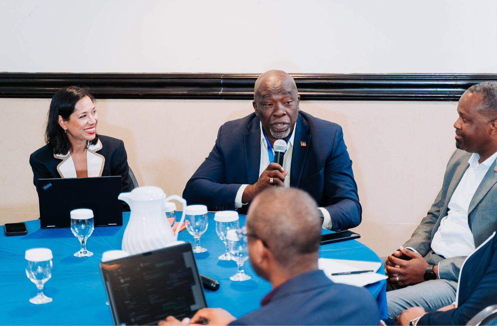 four delegates at the launch of model law on digital trade 