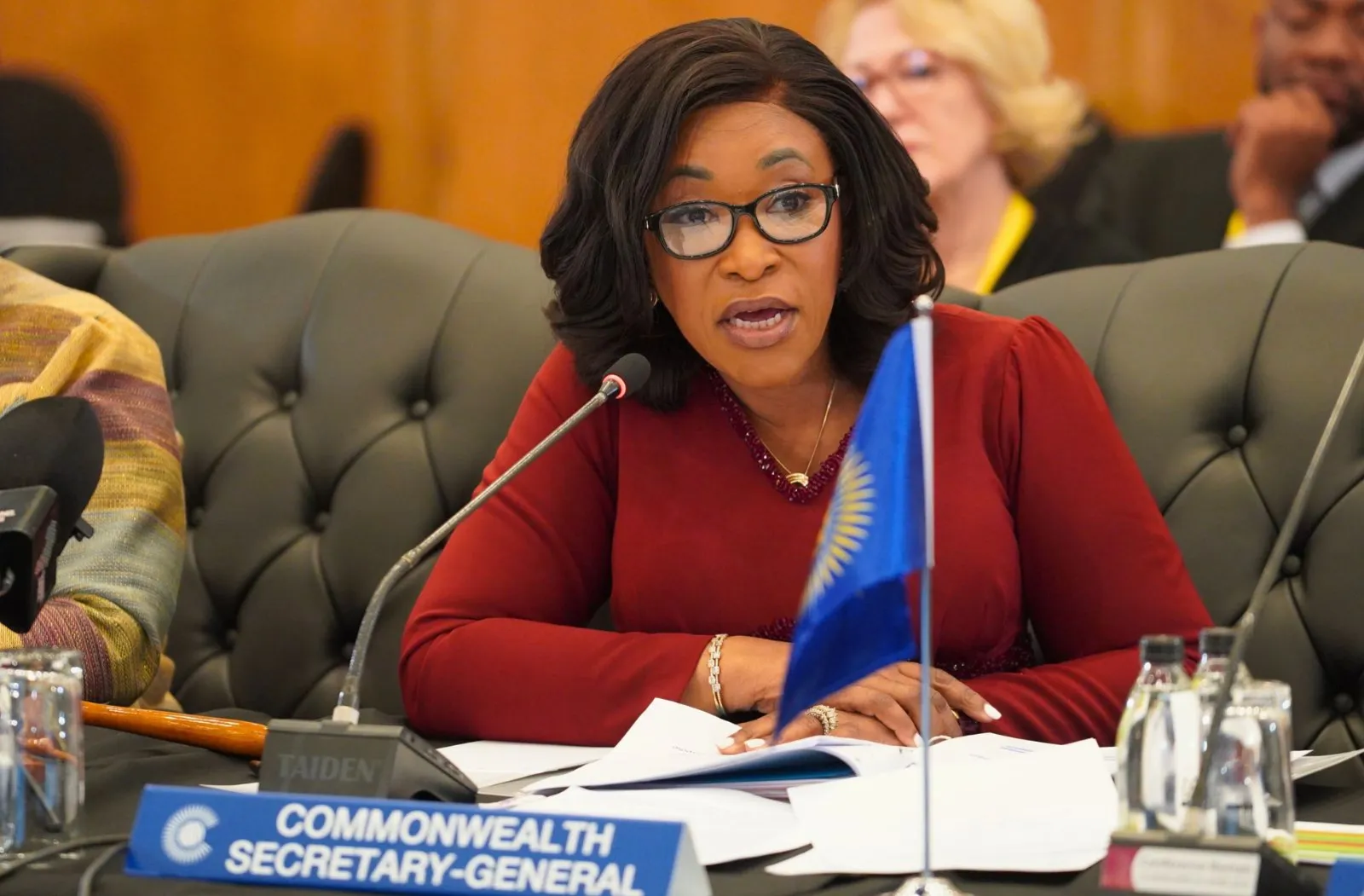 Commonwealth Secretary-General speaking into microphone at the Commonwealth Trade Ministers Meeting
