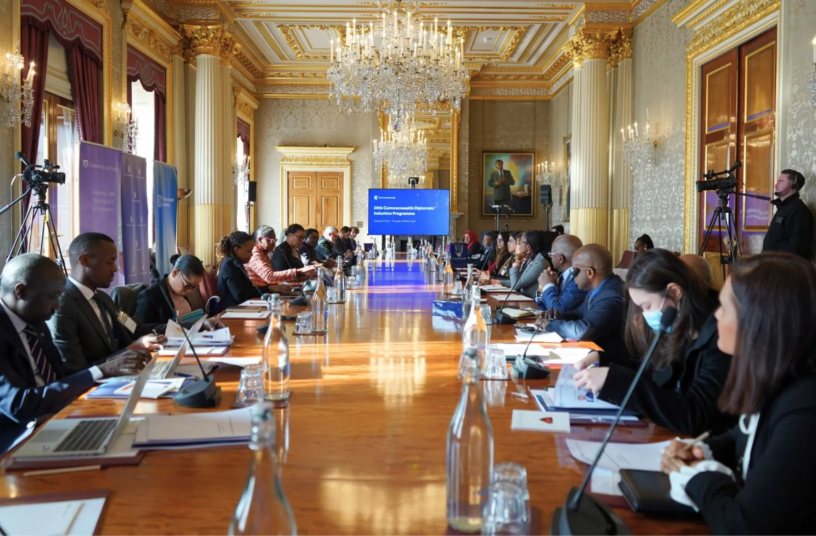 Participants sit at a table during the Commonwealth Diplomats Induction Programme