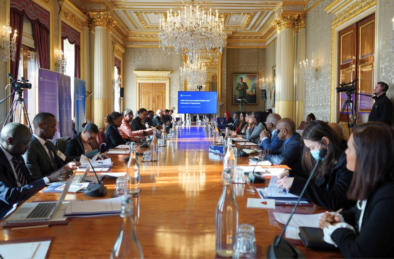 Participants sit at a table during the Commonwealth Diplomats Induction Programme
