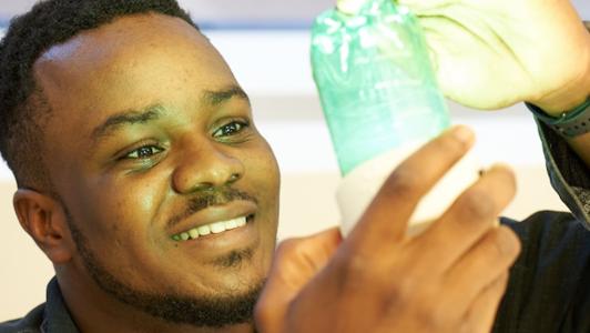 Stanley Anigbogu with solar light.jpg